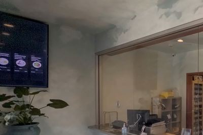Dispensary intake window and digital menu wall